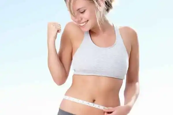 Unraveling the Mystery: Where Does the Body Fat Loss From First? 3 Image of woman happy with fat loss Godalming