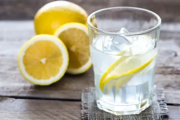 Hydration: The Secret Ingredient for a Toned Stomach and Enhanced Fitness 2 Image of lemon water to aid hydration Godalming