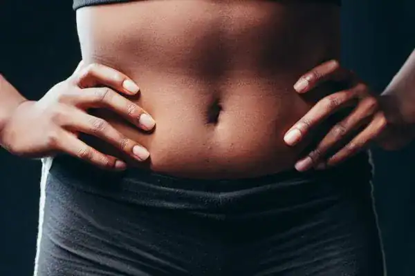 Toning Your Stomach: The Ultimate Guide to Achieving a Sculpted Stomach While Shedding Pounds 1 Image of a toned stomach after non surgical treatment Godalming